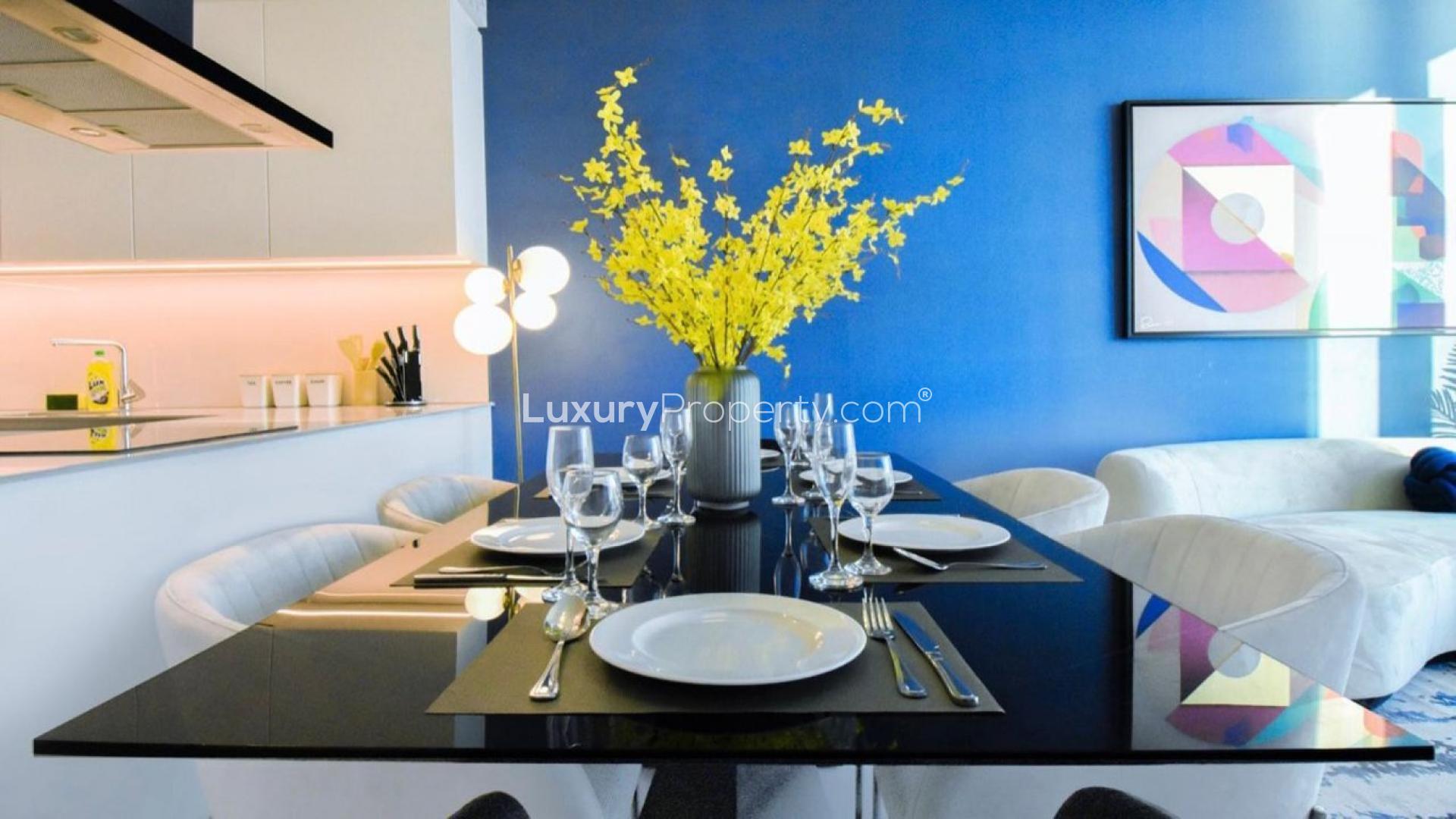 Furnished living room in JBR apartment with sea views, modern decor, and large windows