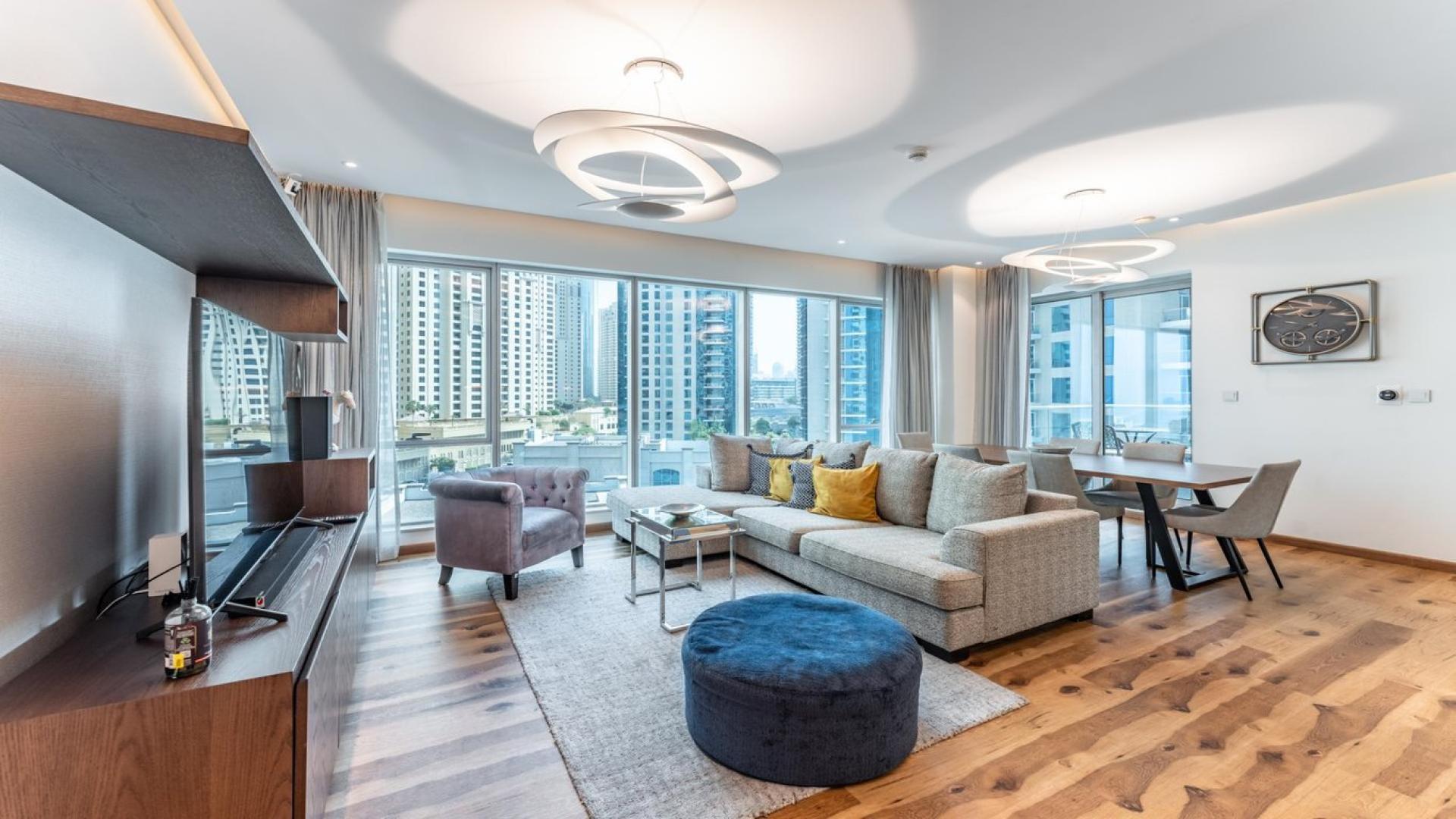 Modern living room in upgraded 2-bedroom apartment, Marina Promenade, Dubai Marina, with city view