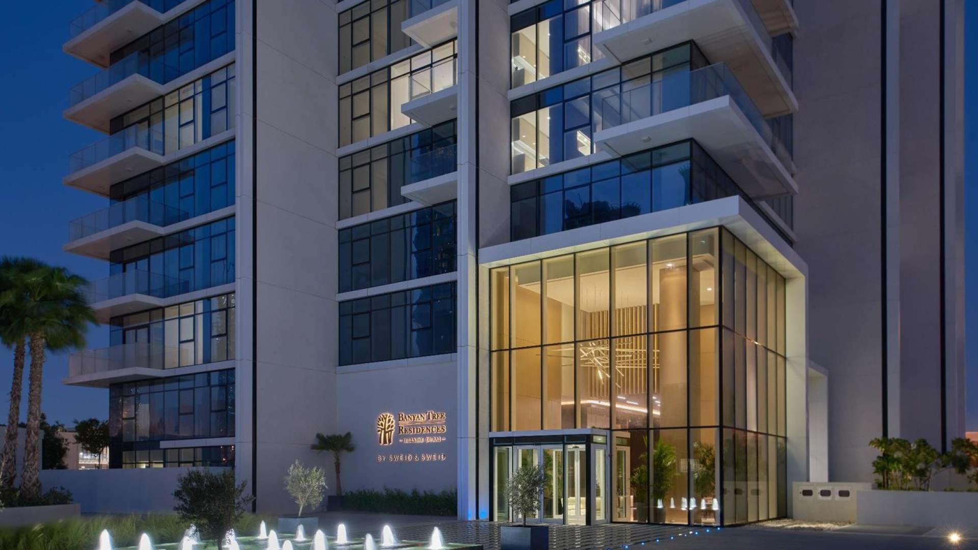 Luxurious living and dining area in Banyan Tree Residences, Hillside Dubai apartment for sale