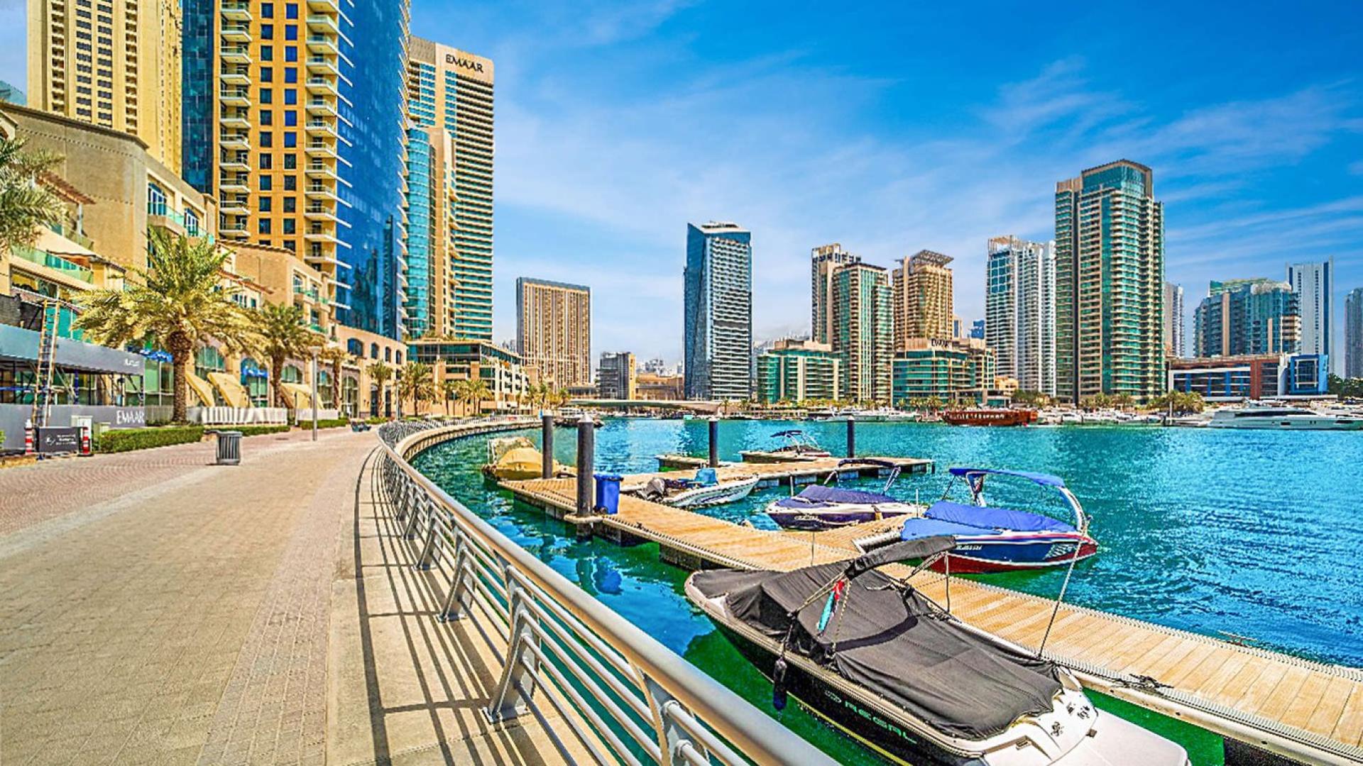 Modern living room with city view in upgraded Dubai Marina apartment, Marina Promenade