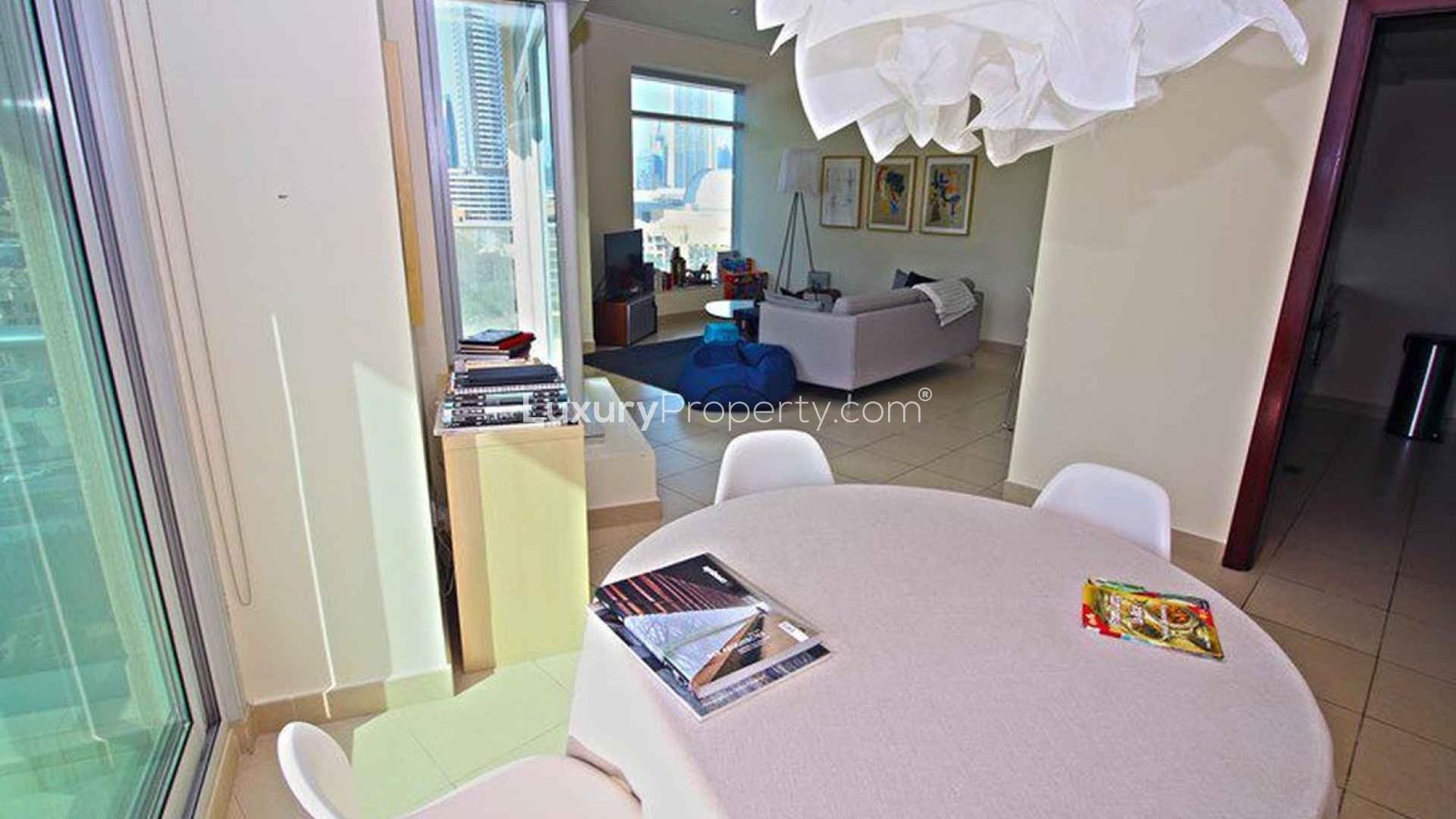 Living room in two-bedroom apartment, Burj Views, Downtown Dubai, bright modern space for sale
