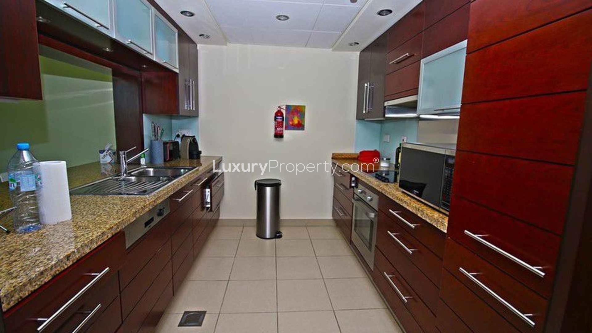 Dining and living area in two-bedroom Burj Views apartment, Downtown Dubai