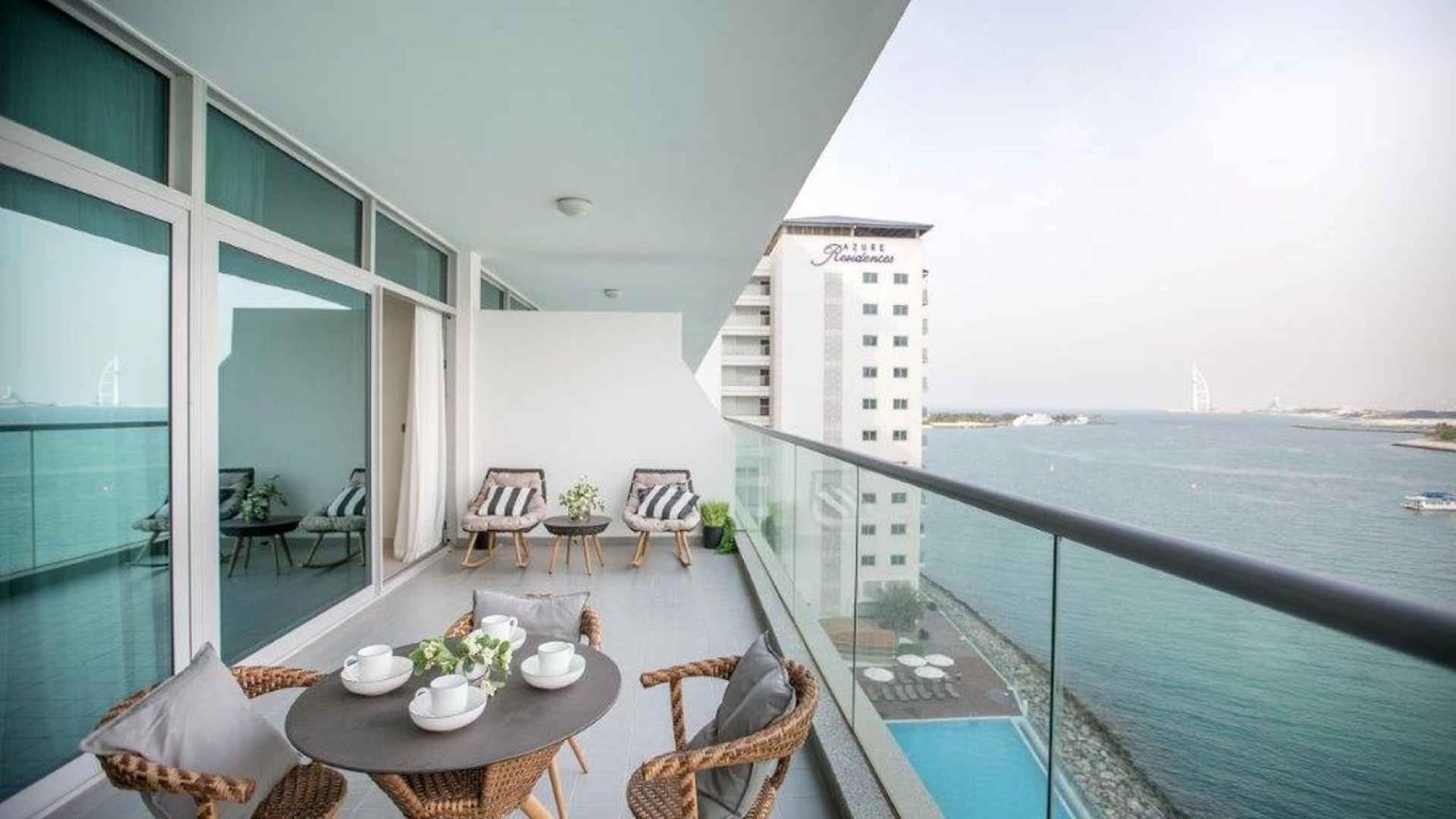 Modern dining and living area in Azure Residences apartment, Palm Jumeirah for sale