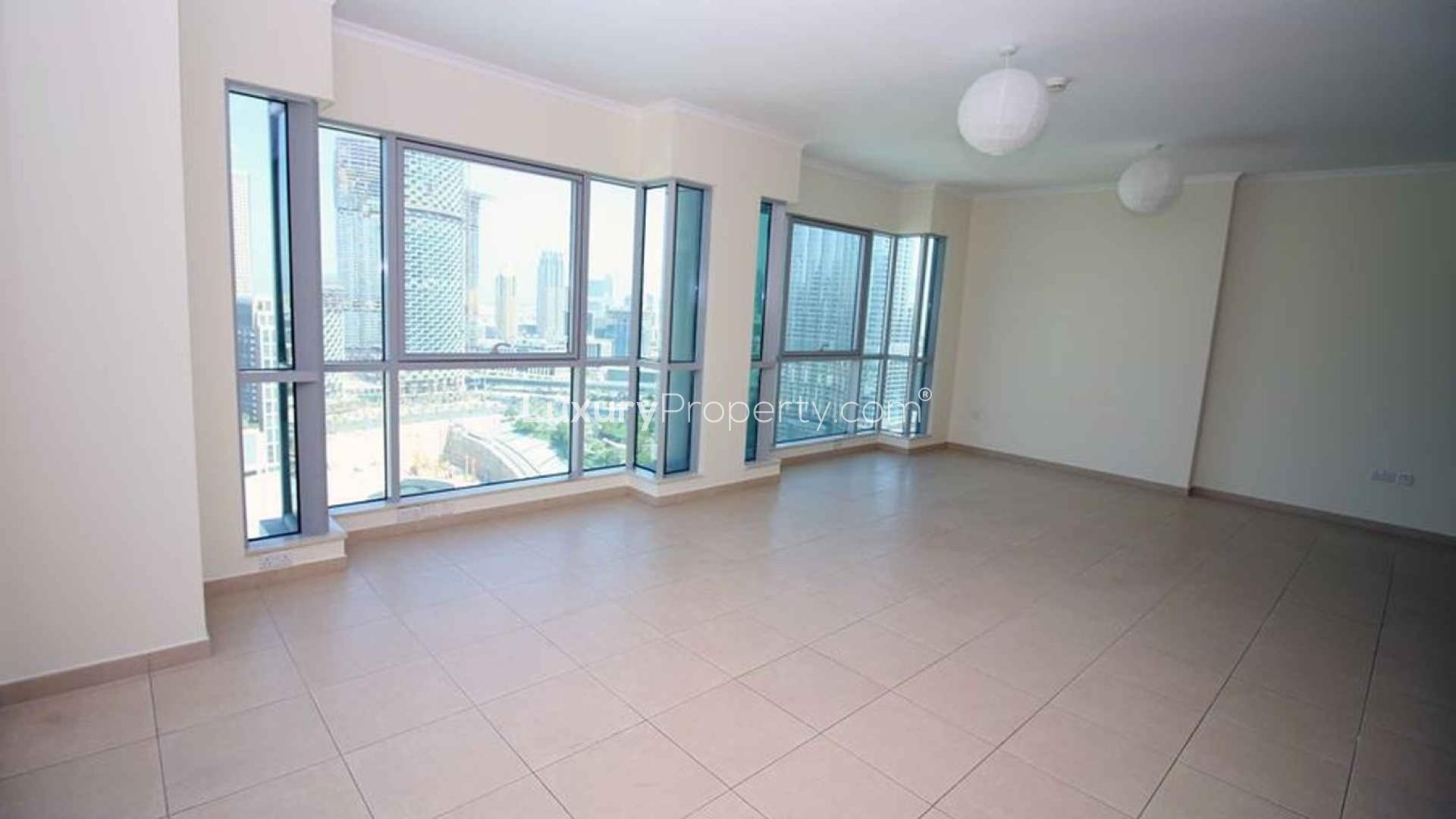 Bright, spacious living room with city views in Downtown Dubai apartment for sale
