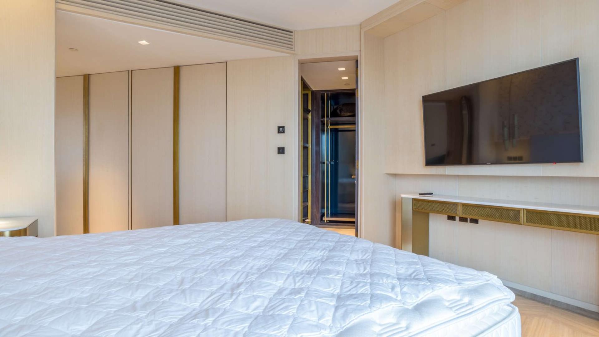 Modern dining area in Palm Jumeirah apartment with sea view balcony