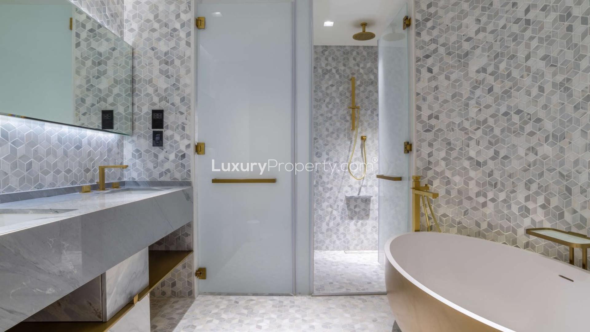 Contemporary dining area in one-bedroom serviced apartment, Five Palm Jumeirah, with city view