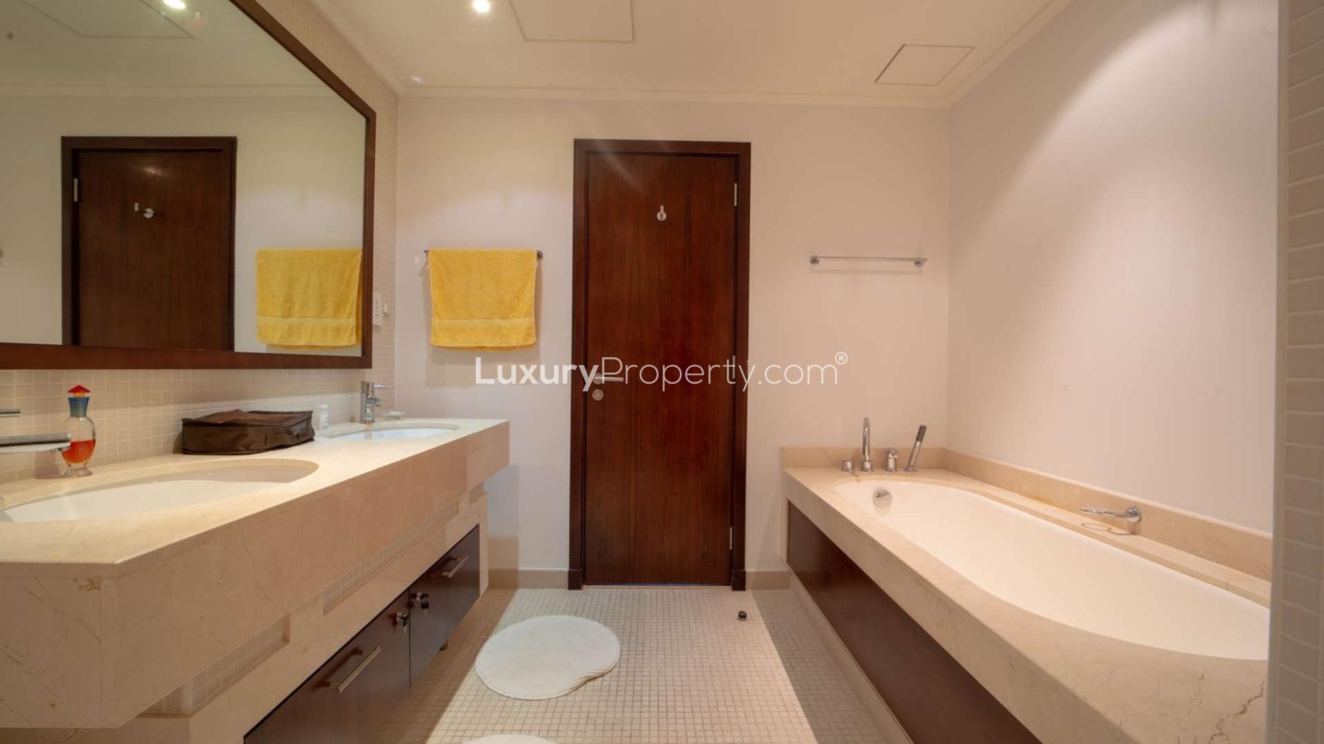 Dubai Marina skyline view from Beauport apartment, featuring waterfront and luxury yachts