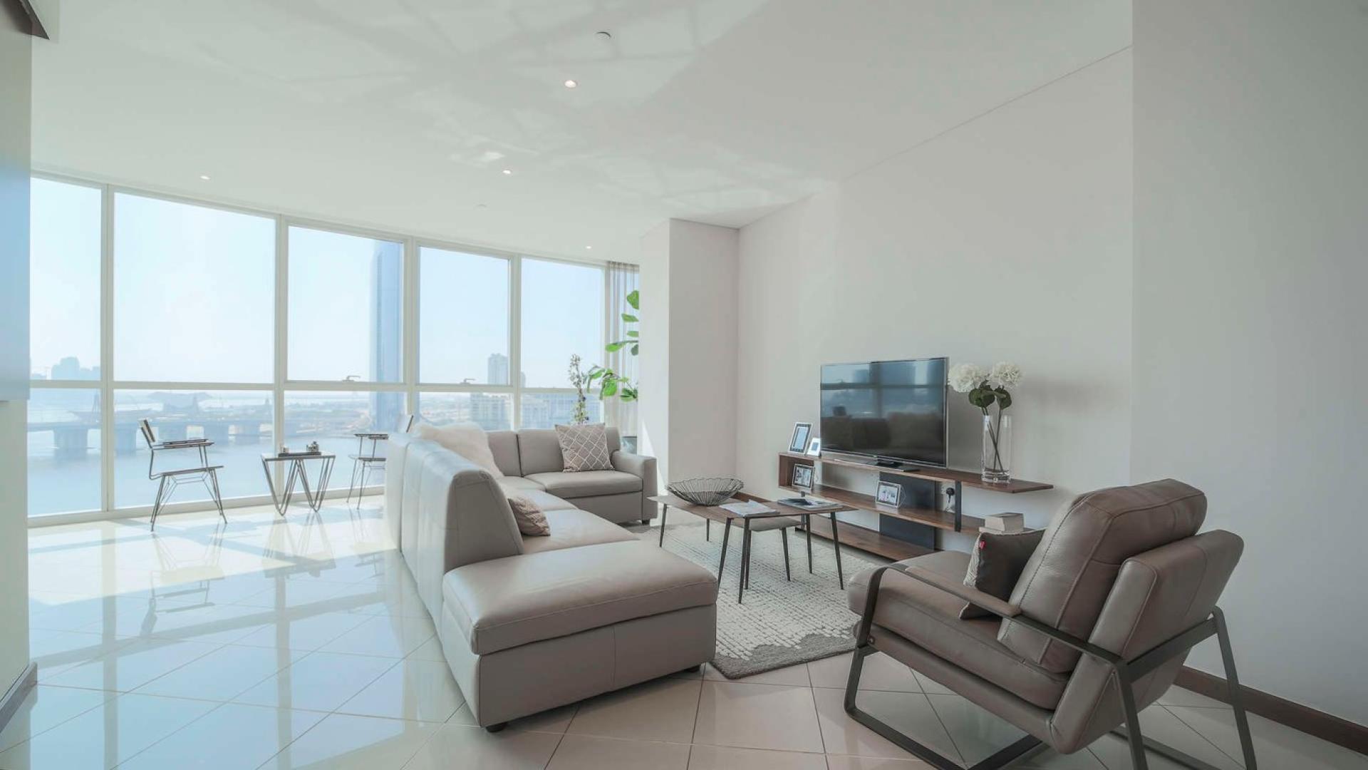 Luxurious living room in Marsa Plaza apartment, Dubai Festival City, with stunning views
