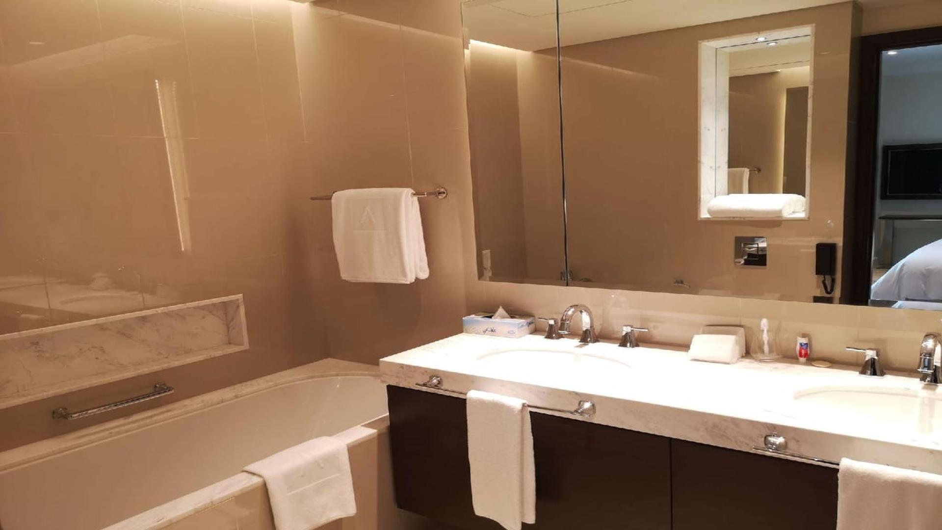 Elegant living room in two-bedroom apartment, The Address Residences Fountain Views, Downtown Dubai