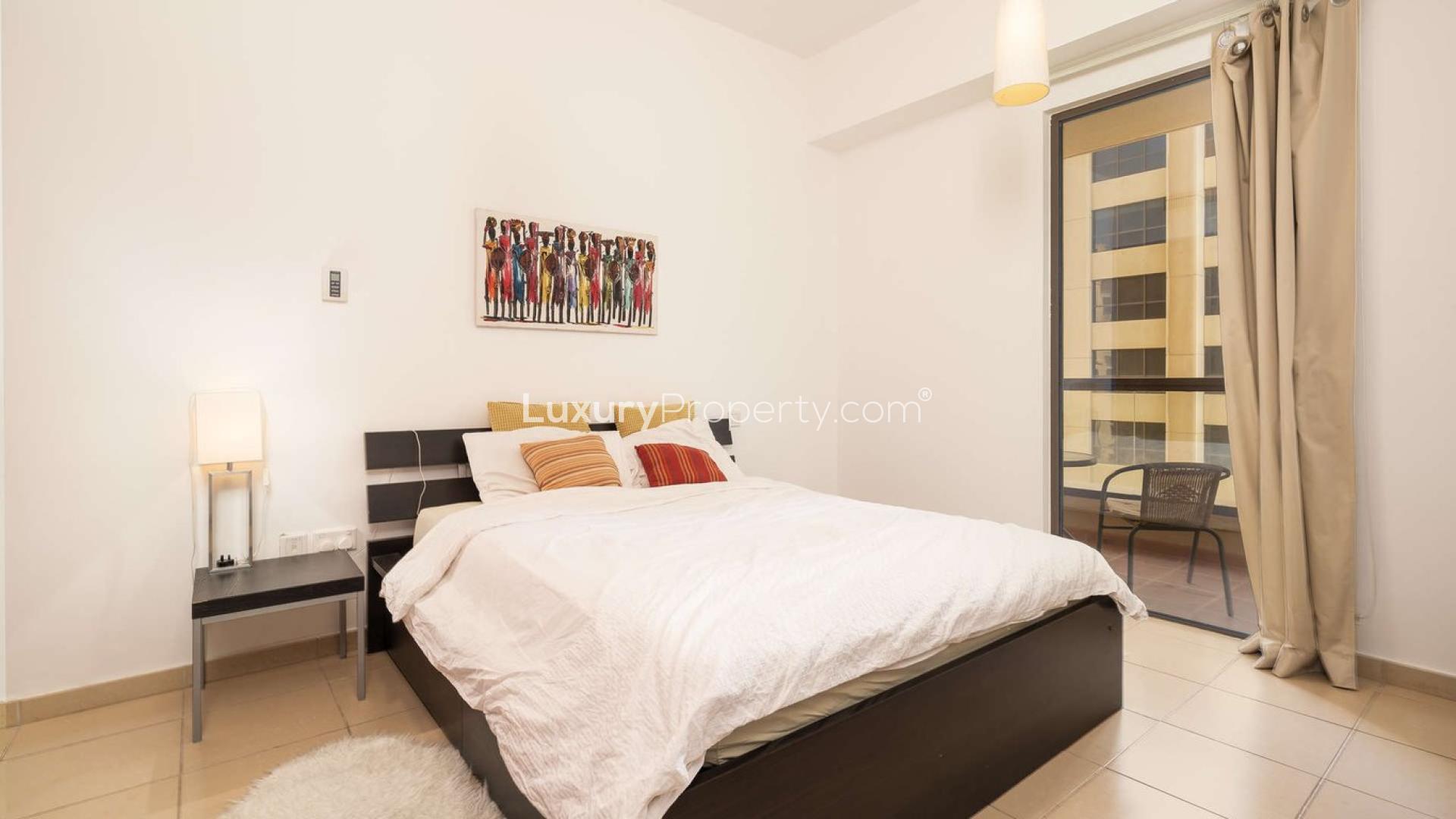 Luxury living room in Rimal apartment, Jumeirah Beach Residence, with modern decor and large window