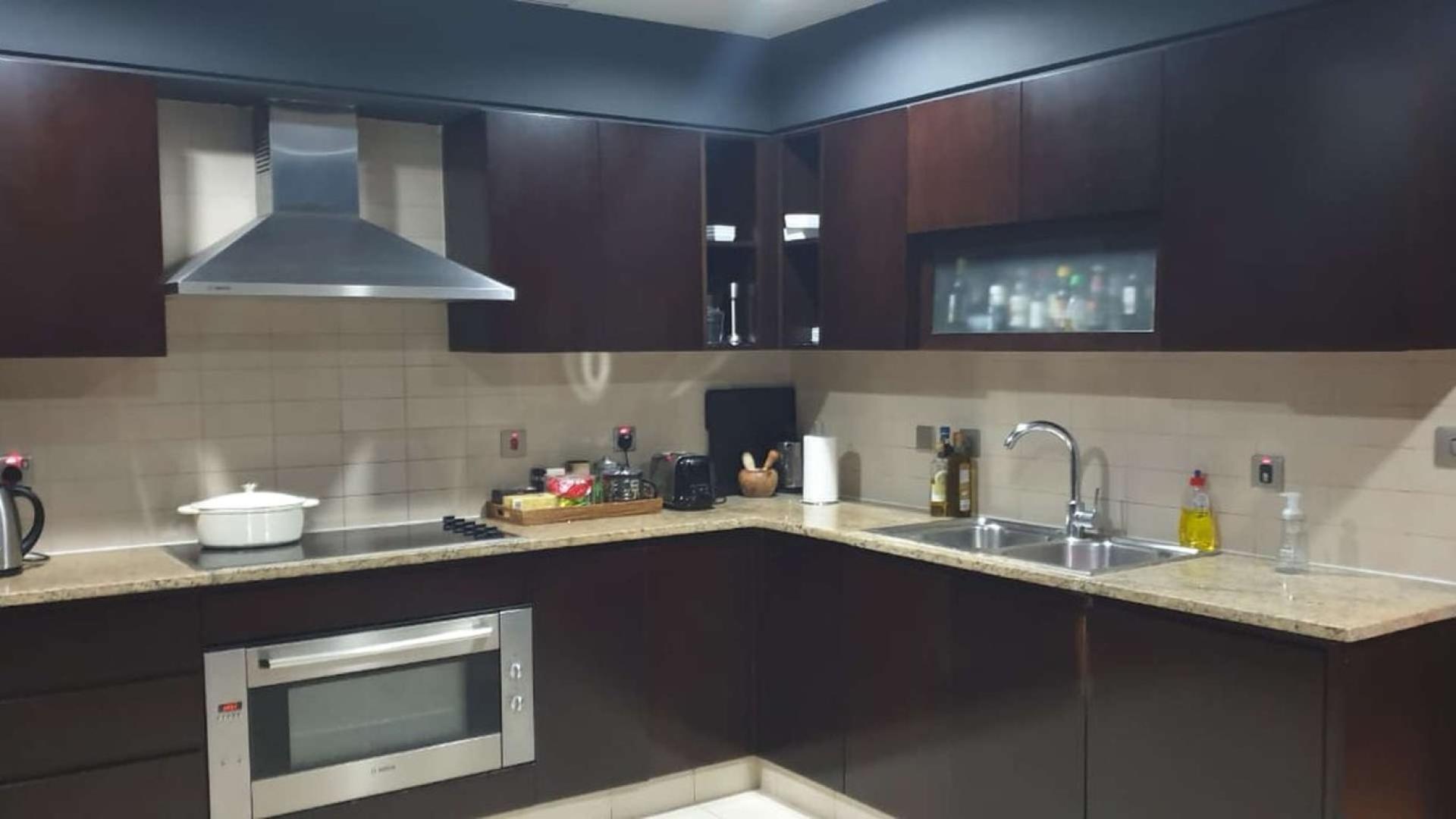 Luxurious living room with marina view in Tiara Residence, Palm Jumeirah apartment for sale