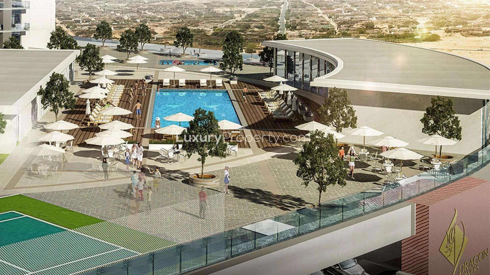 Modern lobby at Dragon Towers apartment, featuring stylish decor and comfortable seating area