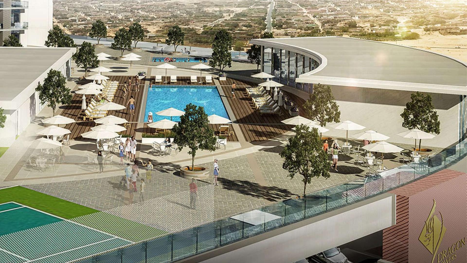 Modern lobby at Dragon Towers apartment, featuring stylish decor and comfortable seating area