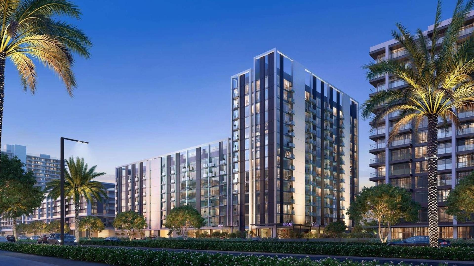 Luxurious lounge area in Golf Ville apartment, Dubai Hills Estate, featuring modern decor and amenities