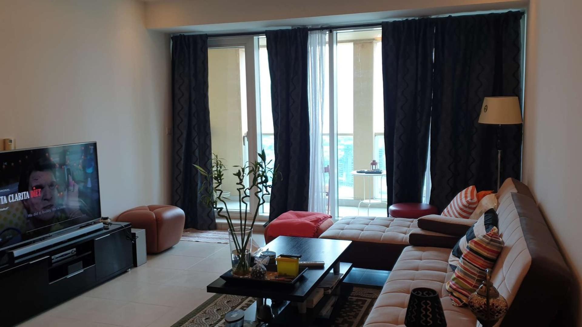 Aerial view of Business Bay canal and skyscrapers near Churchill Tower, Dubai