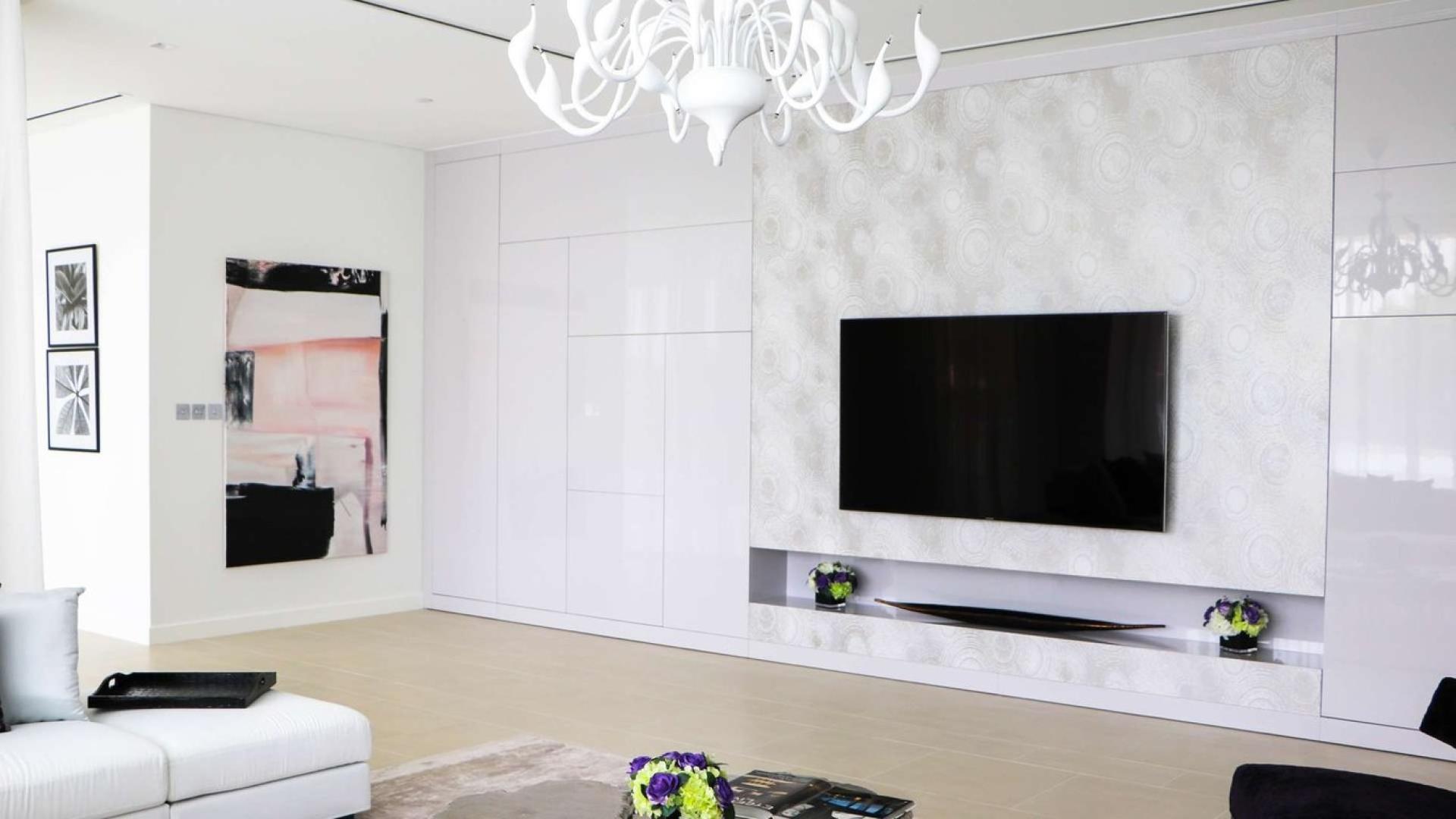 Modern living room in two-bedroom apartment, Seventh Heaven, Al Barari, featuring elegant decor