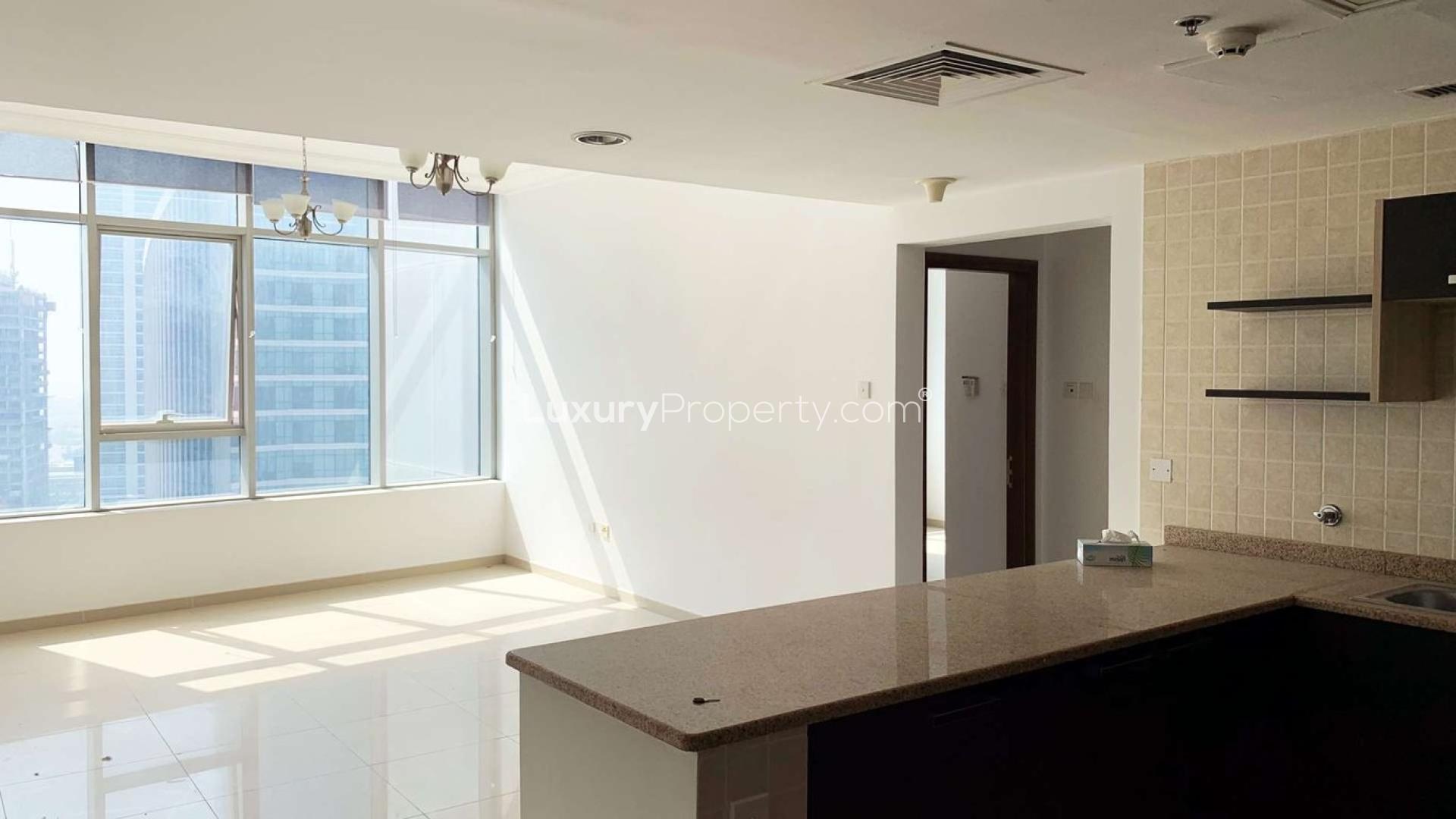 Bright living area in two-bedroom apartment, Ontario Tower, Business Bay, large windows