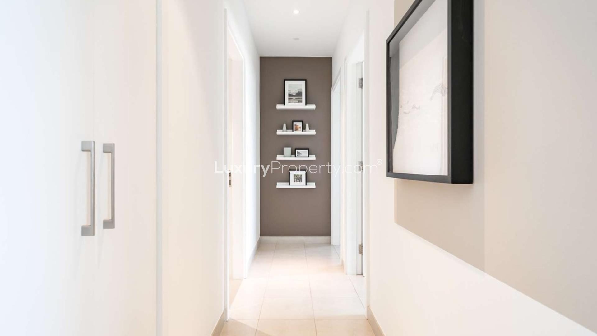 Bright living room in two-bedroom apartment, Golf Views, EMAAR South, Dubai South