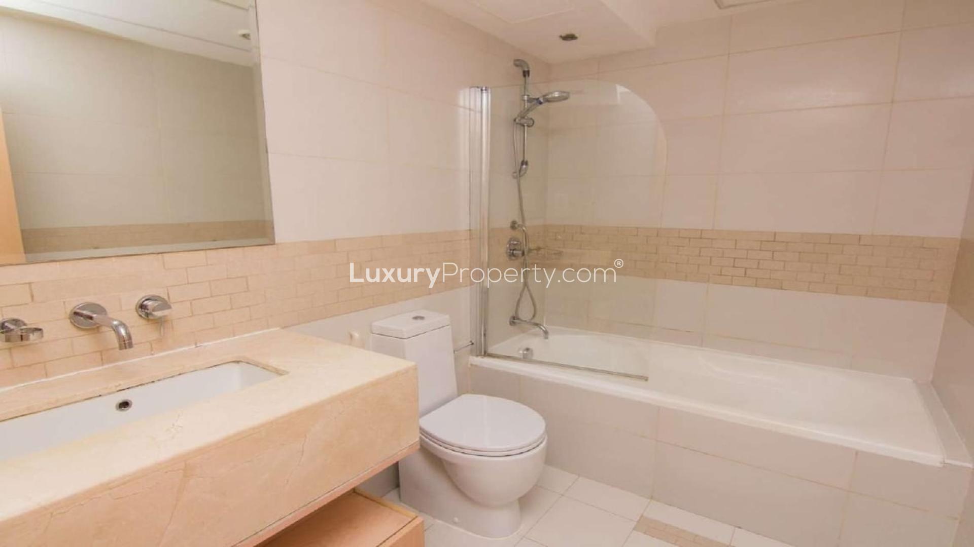 Bright living room with panoramic windows in Dubai Marina apartment, Park Island community