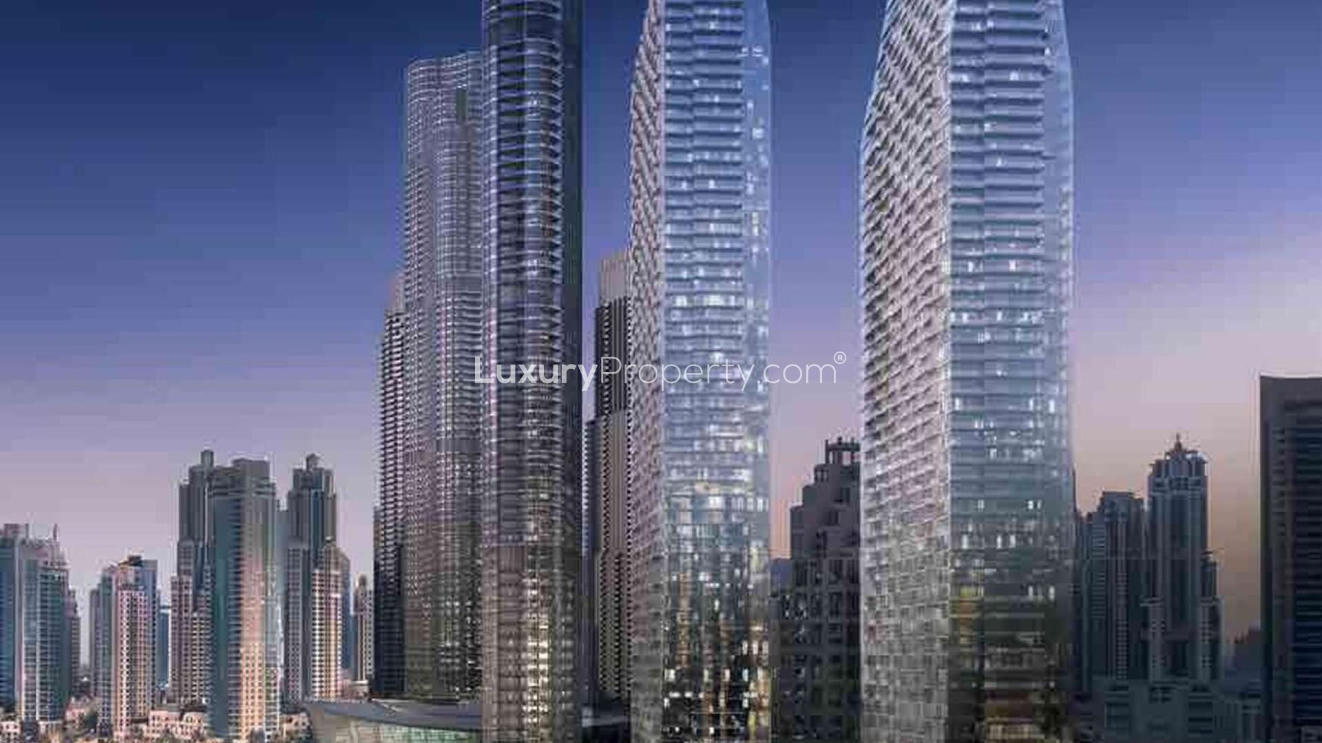 "Modern architecture at The Address Residences Dubai Opera, Downtown Dubai, vibrant community scene.",Exterior view of The Address Residences Dubai Opera, Downtown Dubai, vibrant community setting