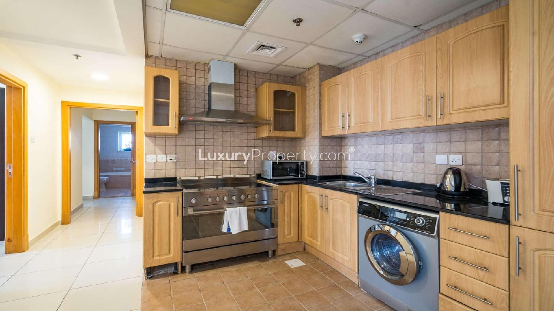 Living room in 2-bedroom apartment, Armada Tower 3, JLT, with modern furniture and city views