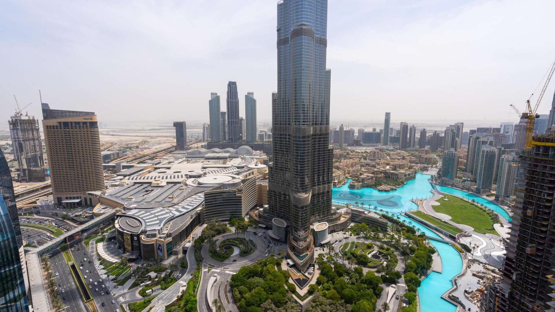 Empty bedroom with large window view in Burj Vista apartment, Downtown Dubai