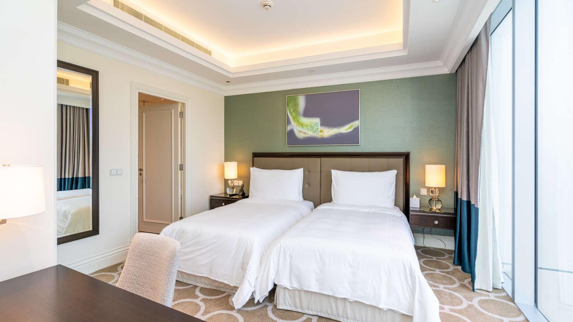 Balcony view from The Address The BLVD apartment overlooking Downtown Dubai skyline