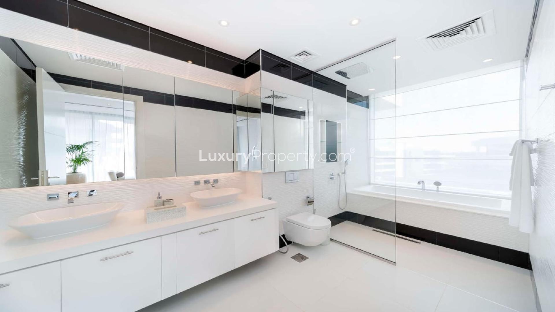 Luxurious living room in duplex apartment at Ashjar, Al Barari, with modern furnishings