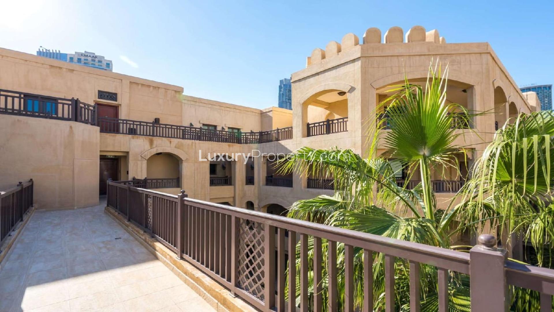 Luxurious 2-bedroom apartment interior with large windows in Al Tajer Residences, Downtown Dubai