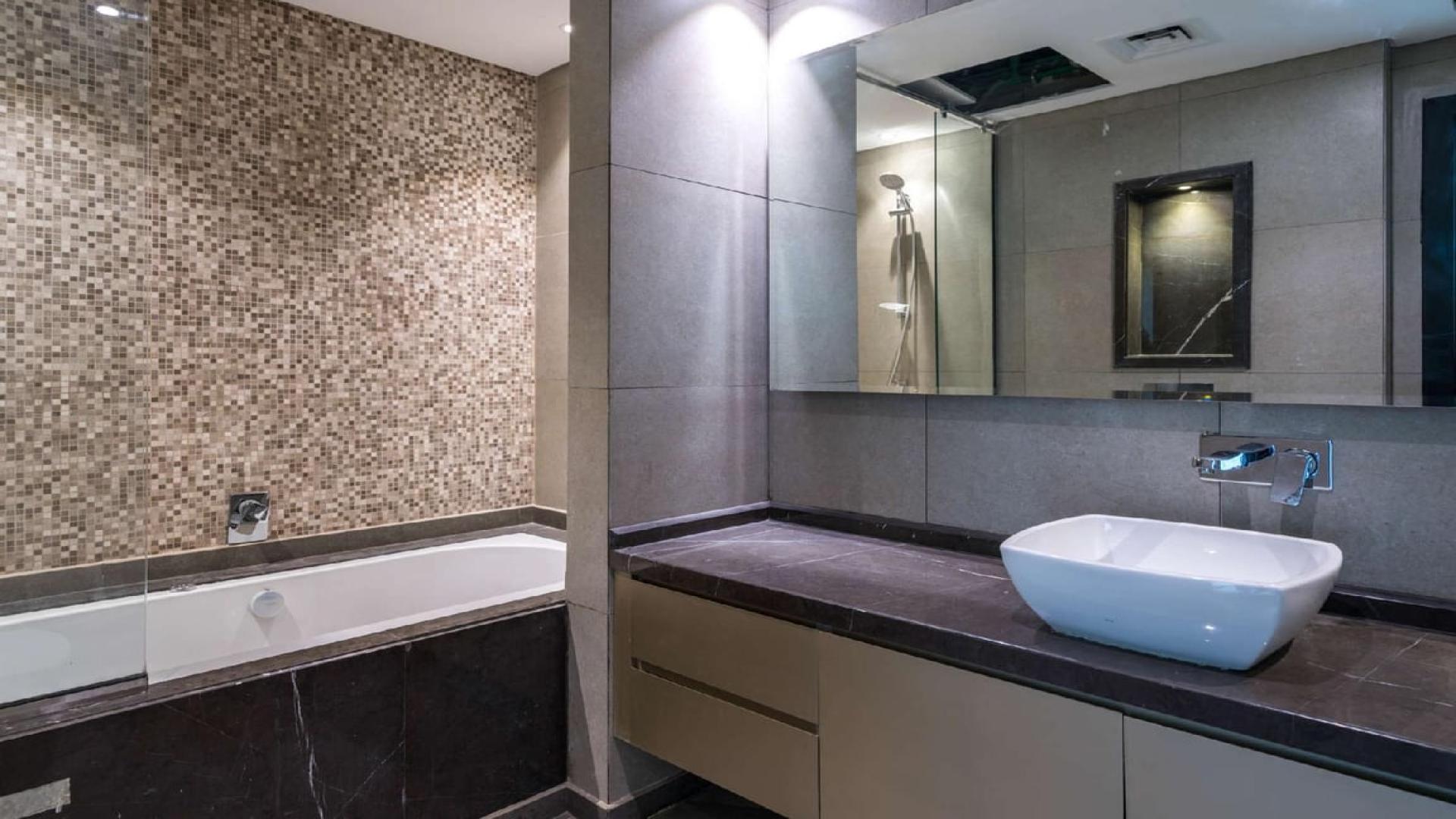 Balcony view from Meydan Avenue apartment for sale, showcasing modern architecture and construction