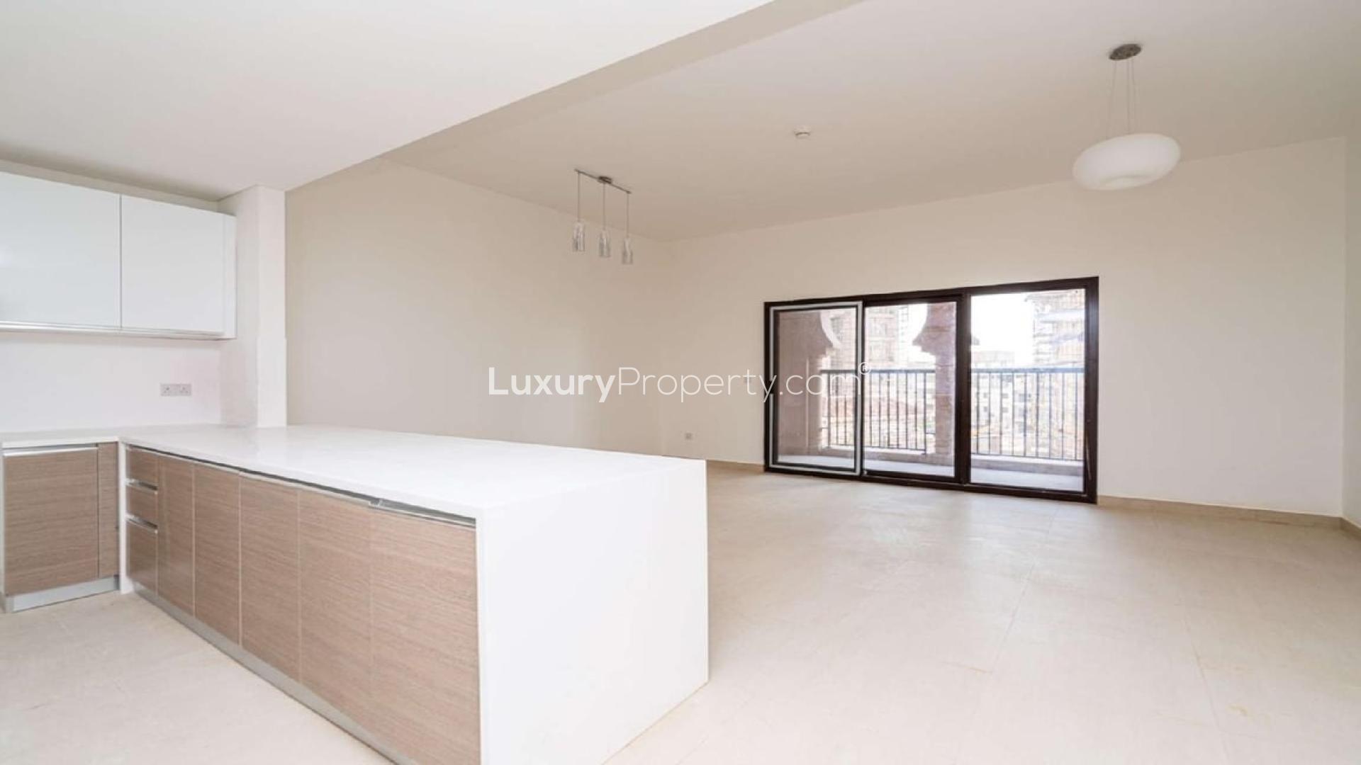 Modern kitchen in luxury Alandalus apartment, featuring sleek cabinetry and spacious countertops