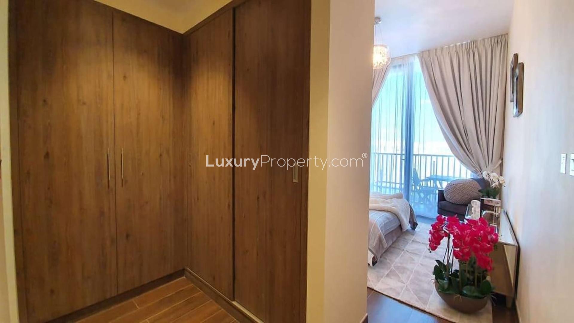 Modern open-plan living area in Q Gardens 2-bedroom apartment, Arjan, with elegant decor