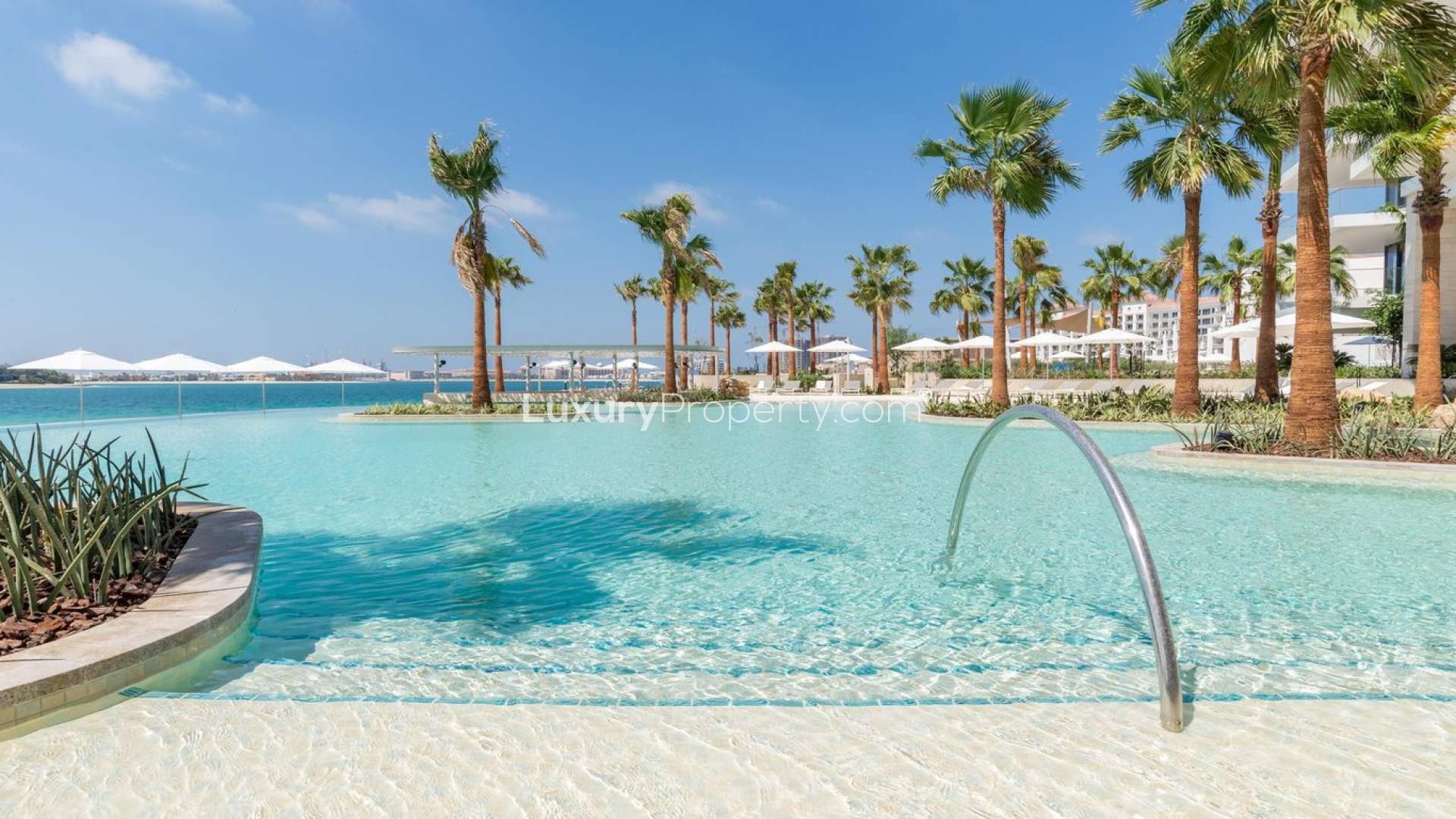 Furnished living room in Serenia Residences apartment, Palm Jumeirah, with modern decor and balcony view