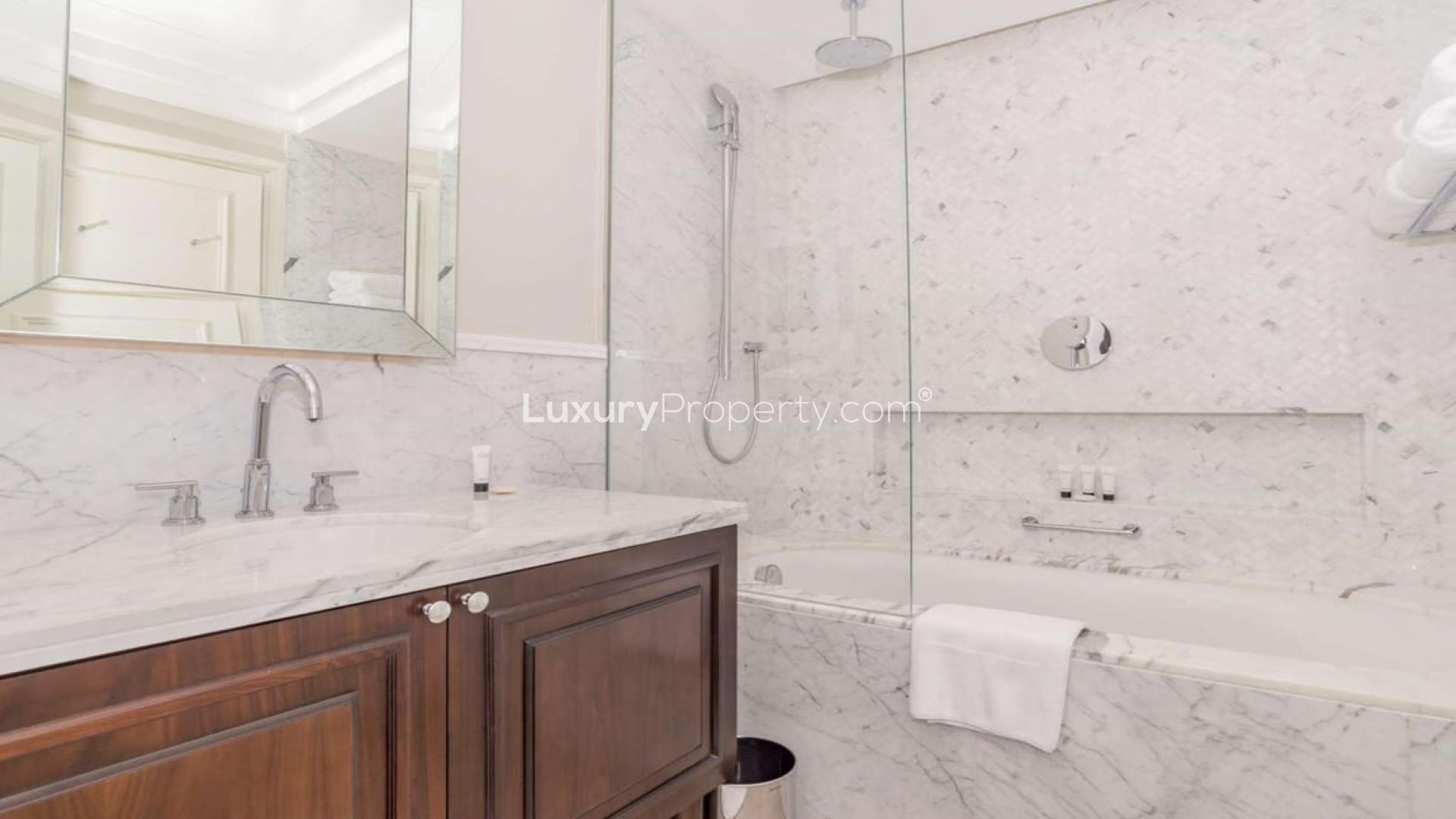 Luxurious bedroom with city view in Downtown Dubai apartment, The Address The BLVD