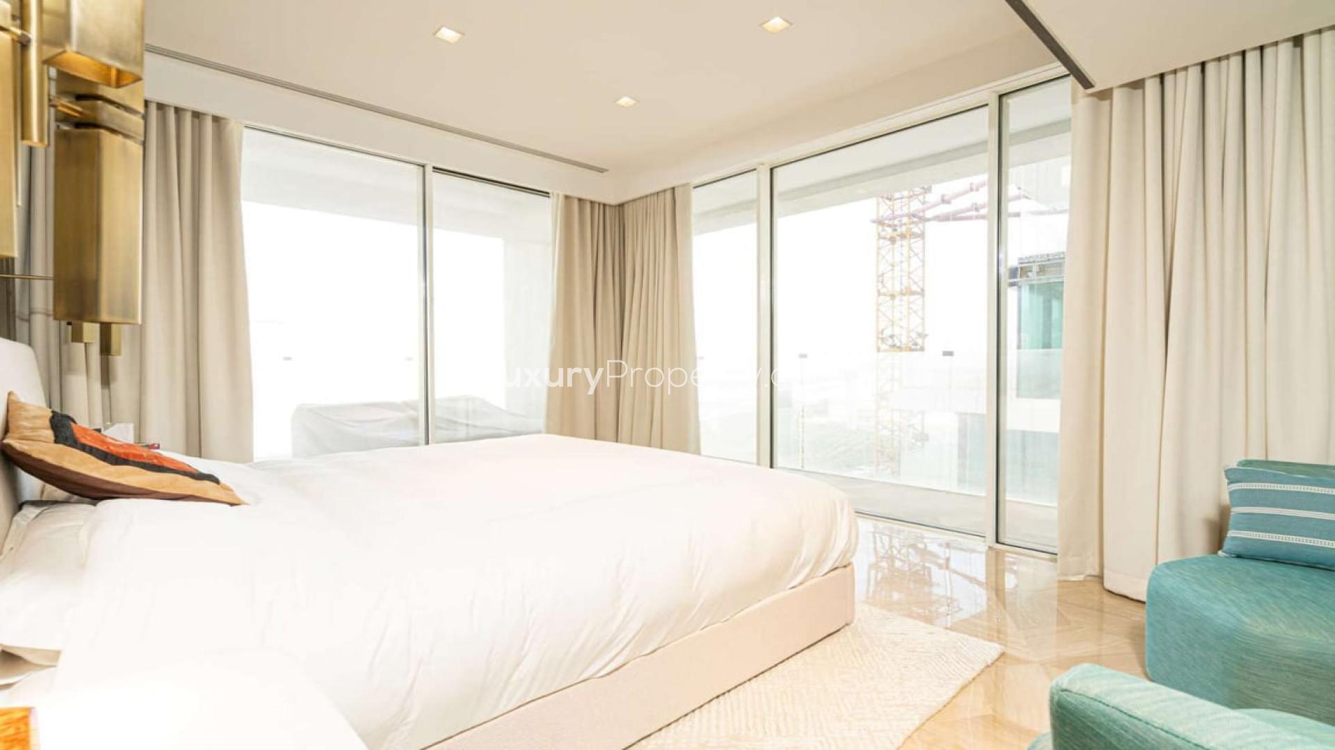 Luxurious living room in two-bedroom apartment, Palm Jumeirah, modern decor, open layout