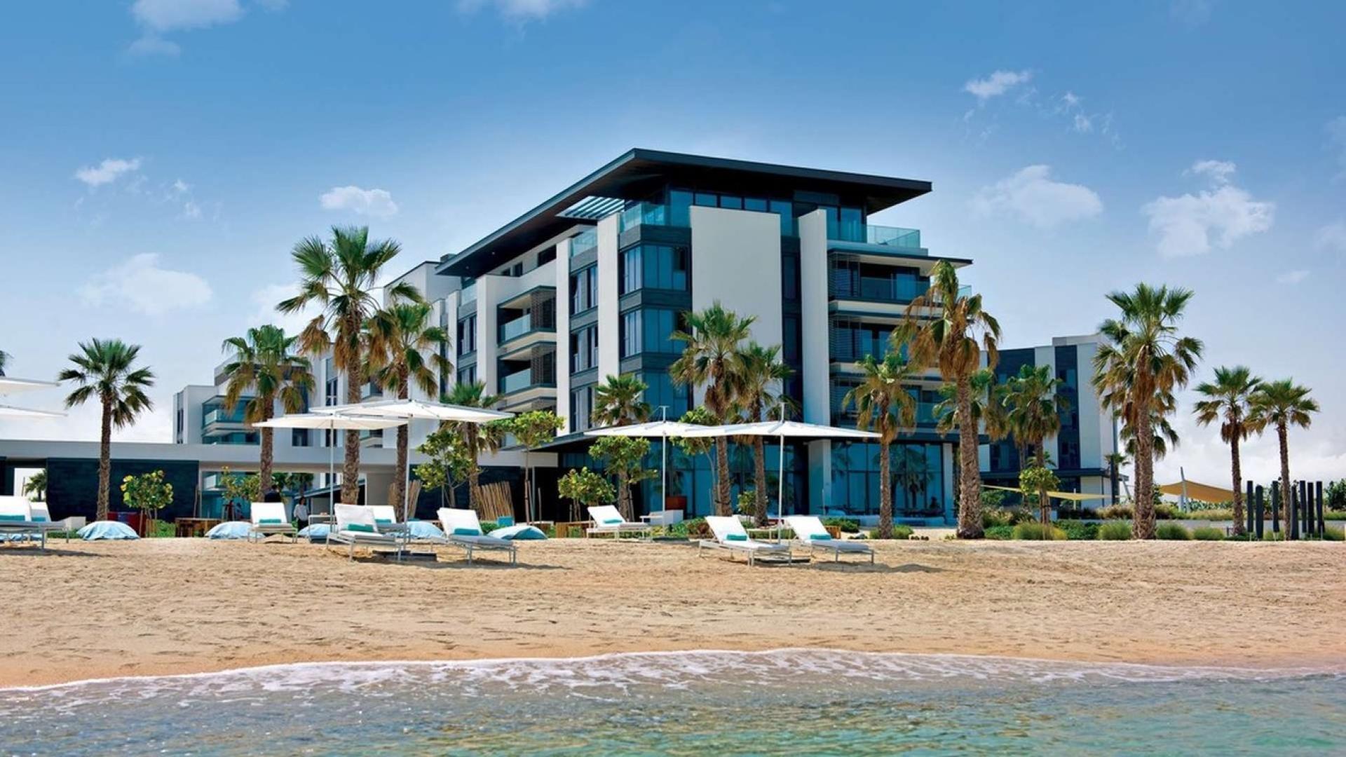 Modern living room with sea view in Pearl Jumeirah apartment for sale