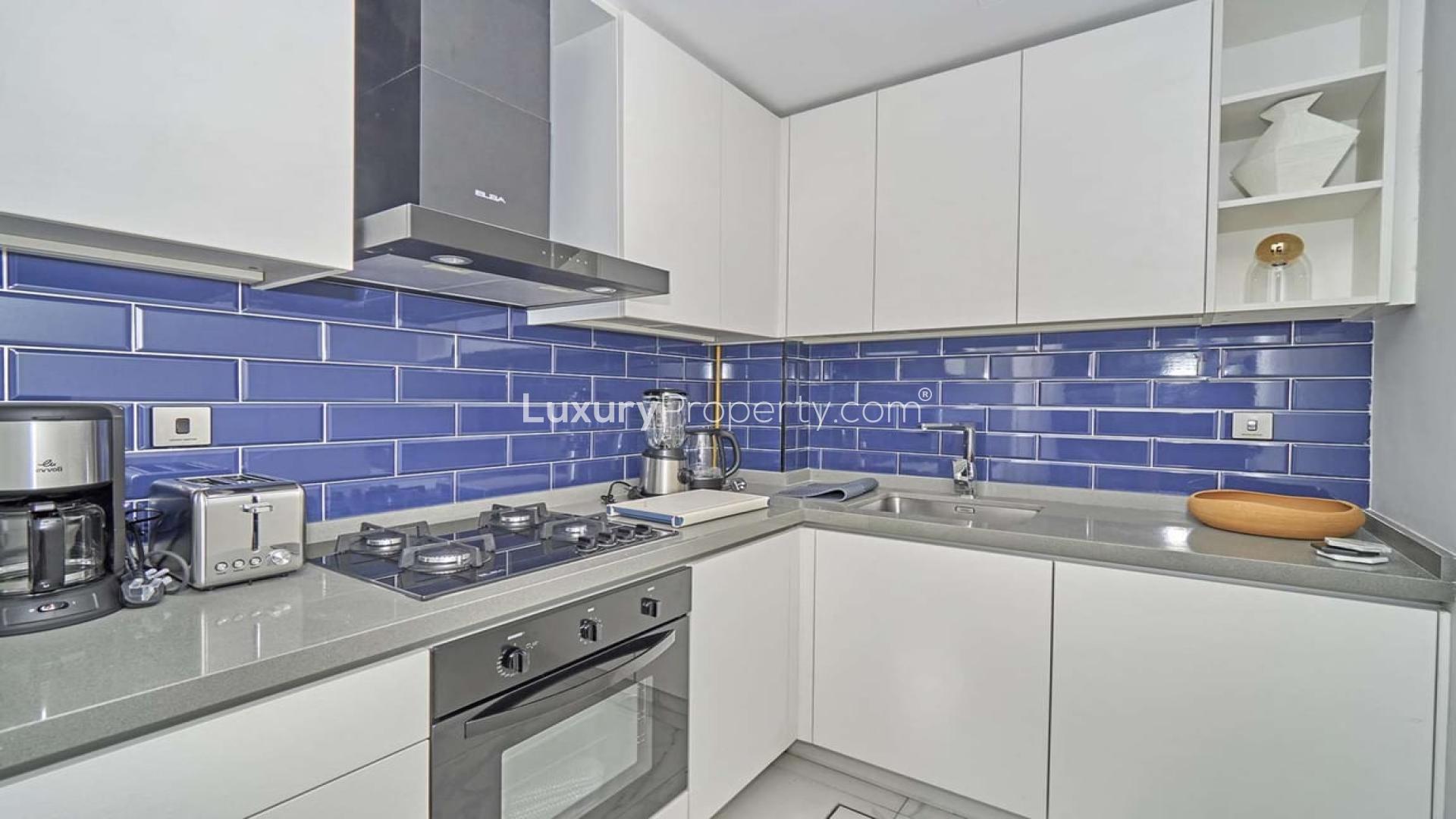 Modern living room in two-bed apartment, MAG 318, Business Bay, Dubai