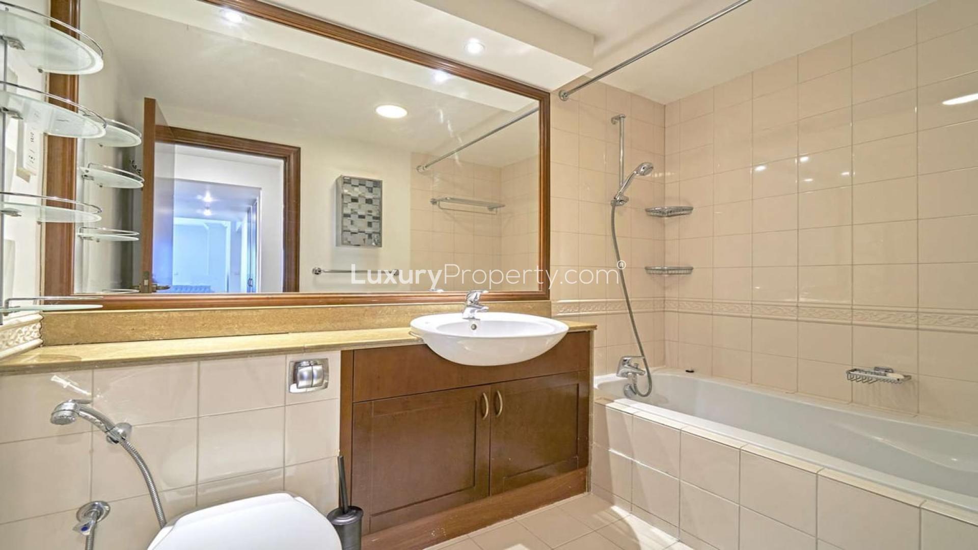 Modern living room in Mesk Tower apartment, Dubai Marina, with full marina view