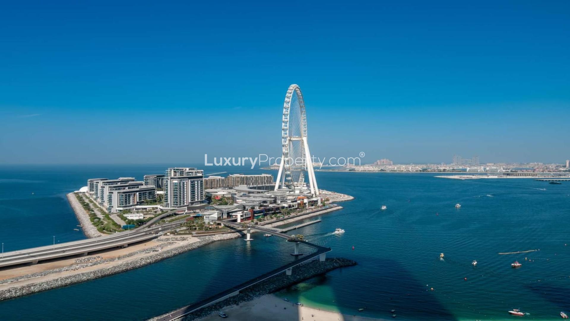 "Stunning view of The Address Jumeirah Resort, Jumeirah Beach Residence skyline, and waterfront.",Aerial view of Jumeirah Beach Residence near The Address Jumeirah Resort apartment