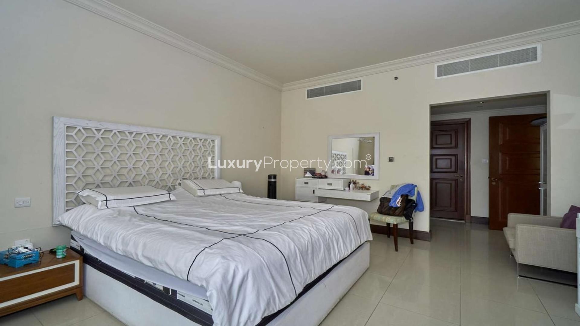 Alt text: "Palm Jumeirah Golden Mile apartment with park view, exclusive C type for sale.",Bedroom interior of 2-bedroom apartment, Golden Mile, Palm Jumeirah, for sale