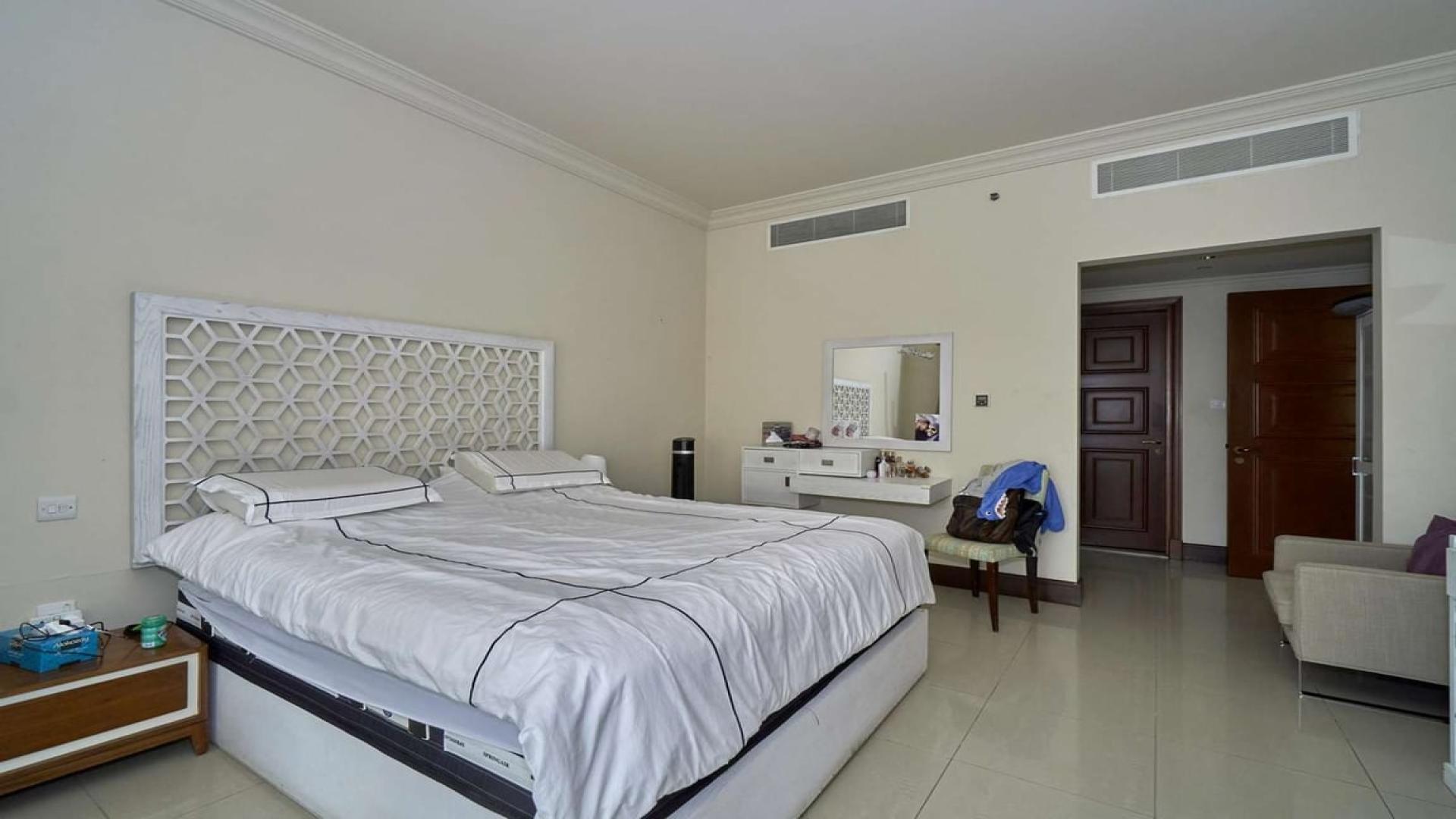 Alt text: "Palm Jumeirah Golden Mile apartment with park view, exclusive C type for sale.",Bedroom interior of 2-bedroom apartment, Golden Mile, Palm Jumeirah, for sale