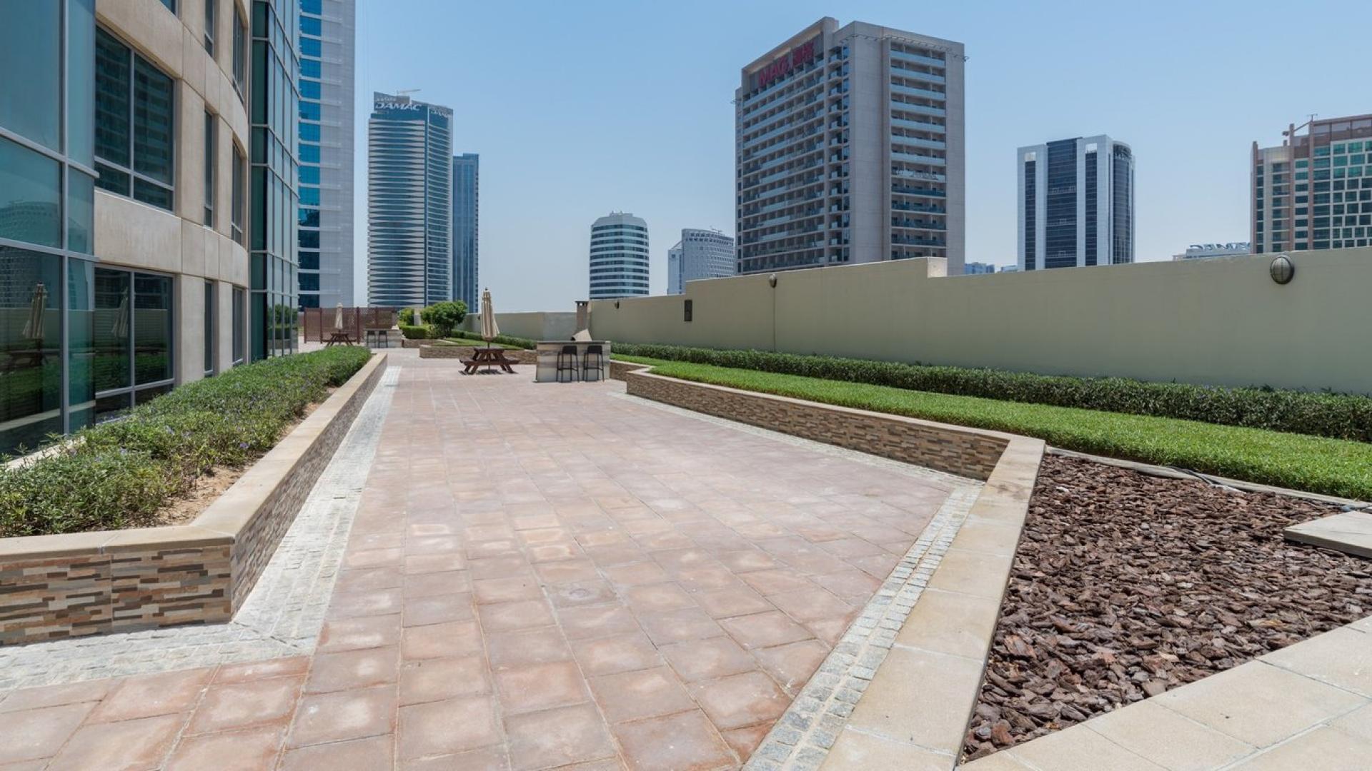 Burj Views apartment complex with pool in Downtown Dubai, spacious residential property for sale