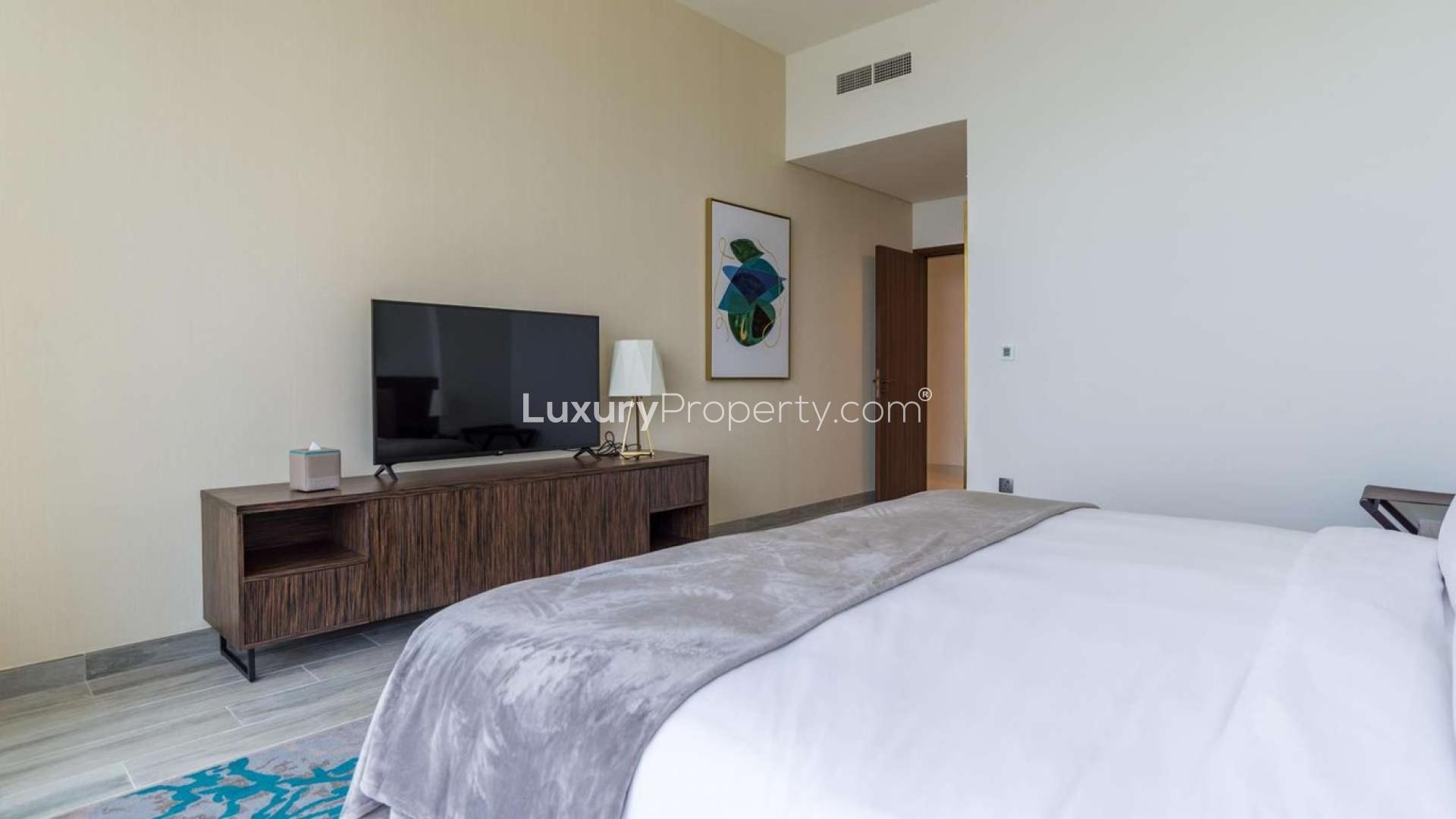 Luxurious furnished living and dining area in Dubai Media City apartment for sale