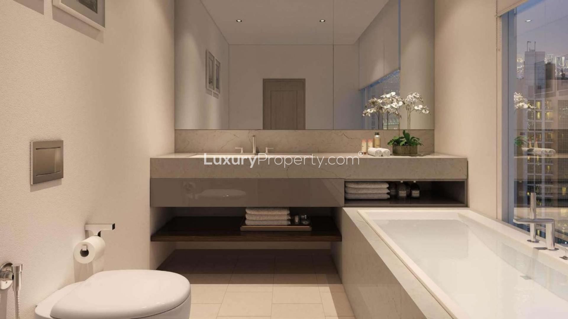 Luxurious bedroom in Act One Act Two apartment, Downtown Dubai, with city view