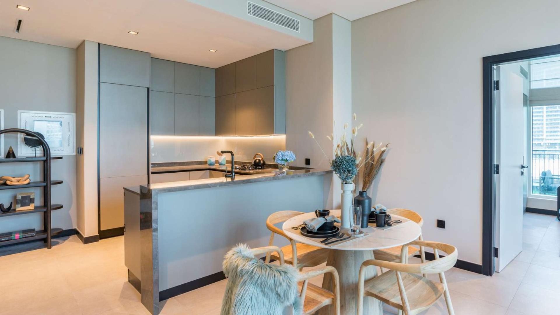 Apartment view of Dubai Canal, Business Bay, 15 Northside, modern skyline, waterfront living