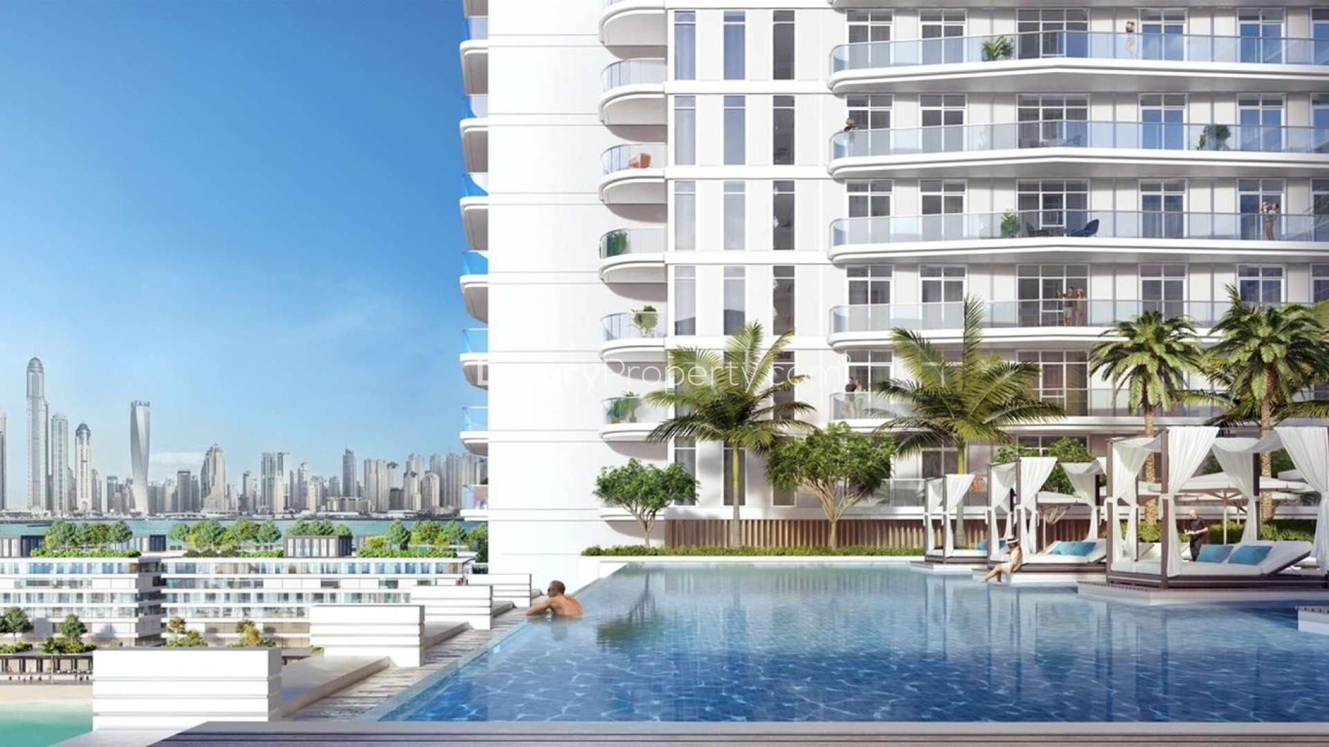 Modern living room and kitchen in Emaar Beachfront apartment, Dubai Harbour