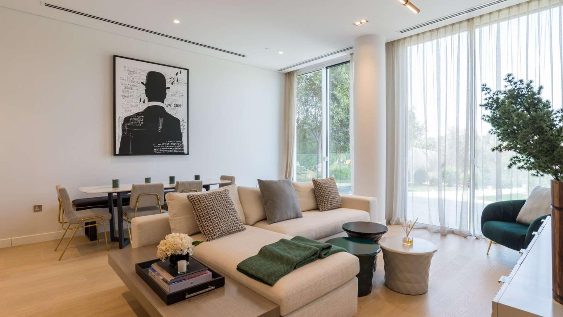 Modern bathroom in Al Barari studio apartment for sale, featuring sleek design and amenities