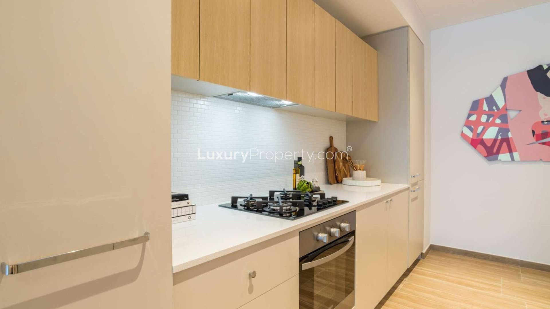 Luxurious studio interior with modern decor in Jumeirah Village Circle apartment, The Sloane