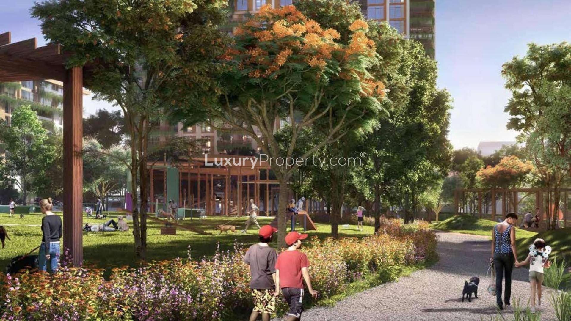 Contemporary apartment living room with elegant decor and park view through large windows