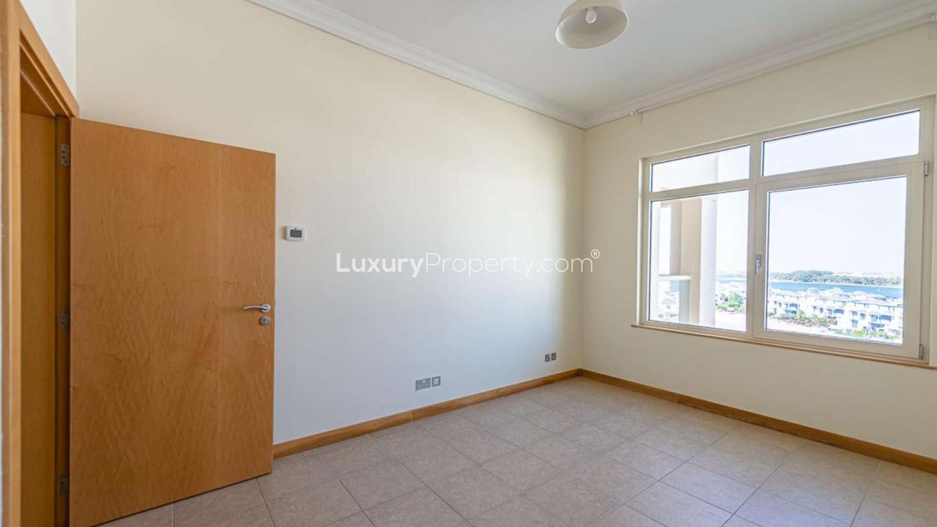 Hallway with arched doorways in Shoreline Apartments, Palm Jumeirah, Dubai
